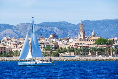 M6AMBH Palma de Mallorca, Spain. View from the sea with boath on a hot summer day.