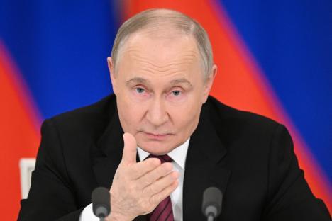 Vladimir Putin giving a statement to the media.