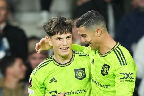 Alejandro Garnacho and Cristiano Ronaldo of Manchester United celebrating a goal.