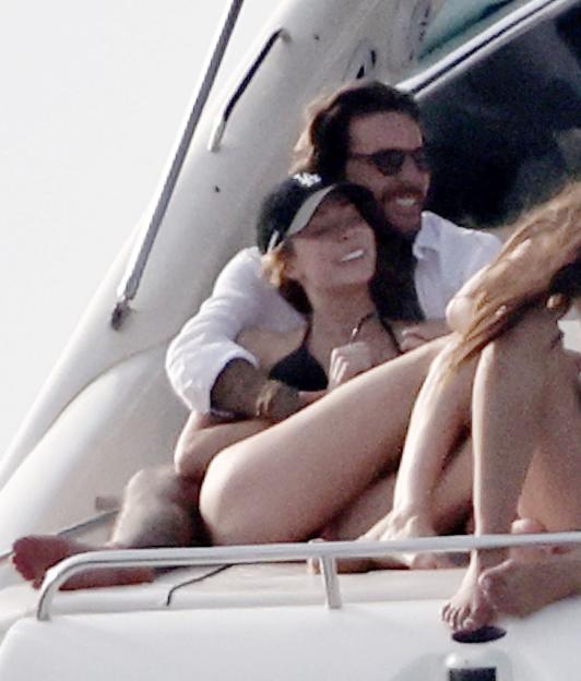 Olivia Attwood and Pete Wicks embracing on a boat.