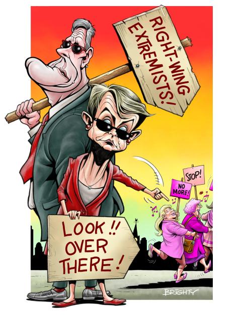 Illustration of two people carrying signs, one saying "Right-wing extremists!" and the other "Look! Over there!", while pointing at a group of women protesting.
