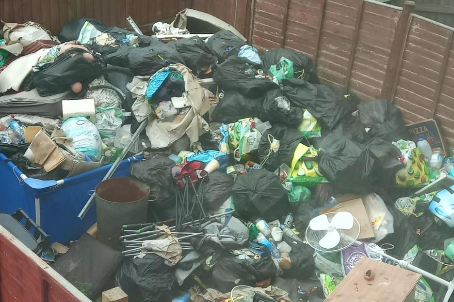 My next door neighbours have the biggest pile of rubbish in their garden people have ever seen & their dogs EAT from it