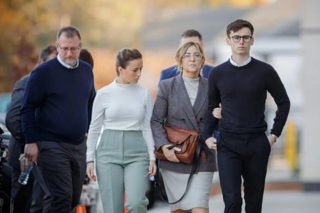 An image collage containing 1 images, Image 1 shows The Corbett family members walking into a courthouse