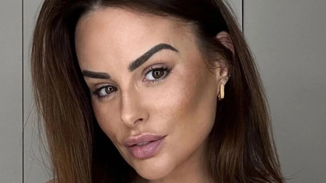 Rhian Sugden shows off the results of boob job in plunging top after going down FIVE cup sizes