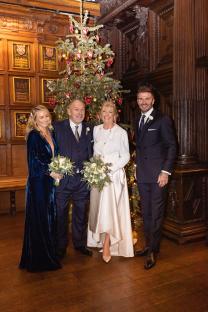 Photo of Ted and Hilary Beckham's wedding with family.