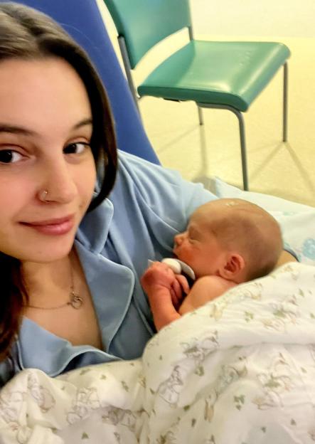 Megan Isherwood holds her baby, Jackson, for the first time.