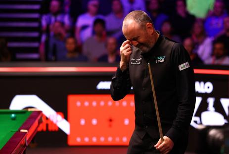 Mark Williams reacting during a snooker match.