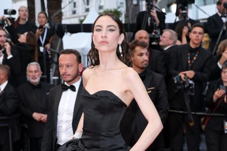 Huge noughties presenter looks worlds away from her TV days on the red carpet with Angelina Jolie – could you spot her?