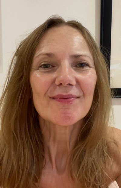 Selfie of journalist Sam Brick without makeup.