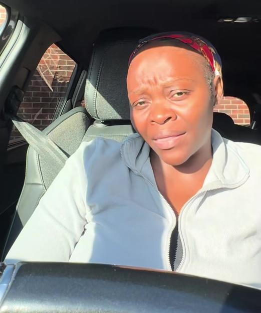 Woman in car expressing disagreement about parents wearing pajamas for school runs.