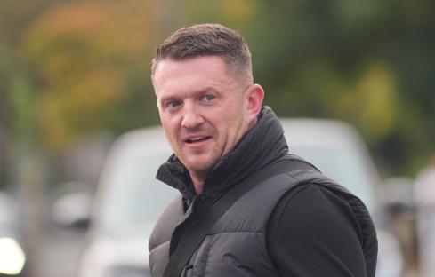 Tommy Robinson outside a police station.