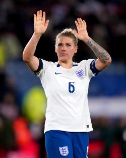 Millie Bright, England soccer player, waving to the crowd.