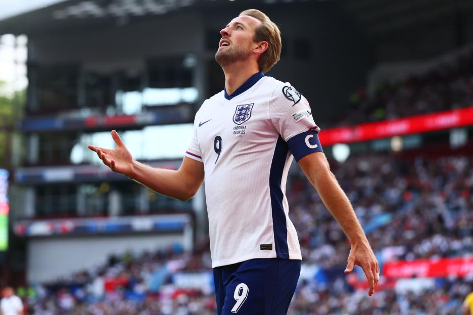 Harry Kane of England looks dejected during a soccer match.