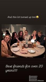 Victoria Beckham dining with friends.