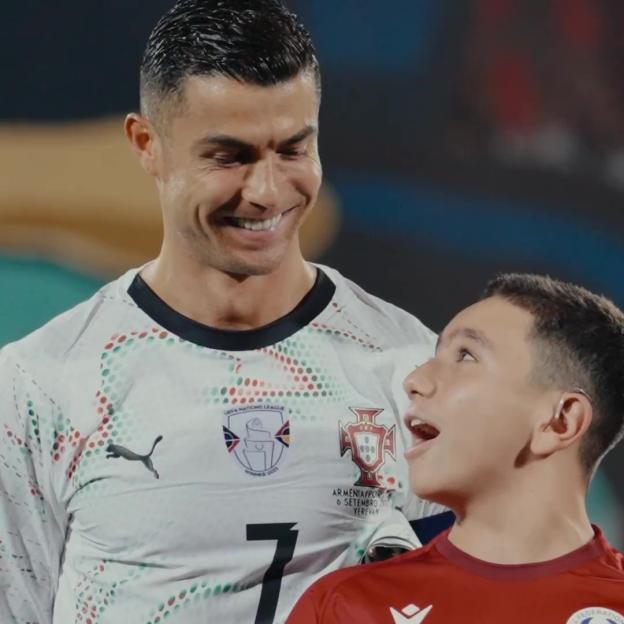 Cristiano Ronaldo consoles mascot as awestruck kid breaks down in tears before walking on to pitch with Portugal icon