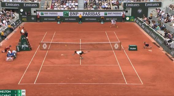 Tennis match in progress.