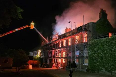 Huge fire rips through nine-bed mansion on millionaire’s row reducing home to ashes in Bank Holiday horror