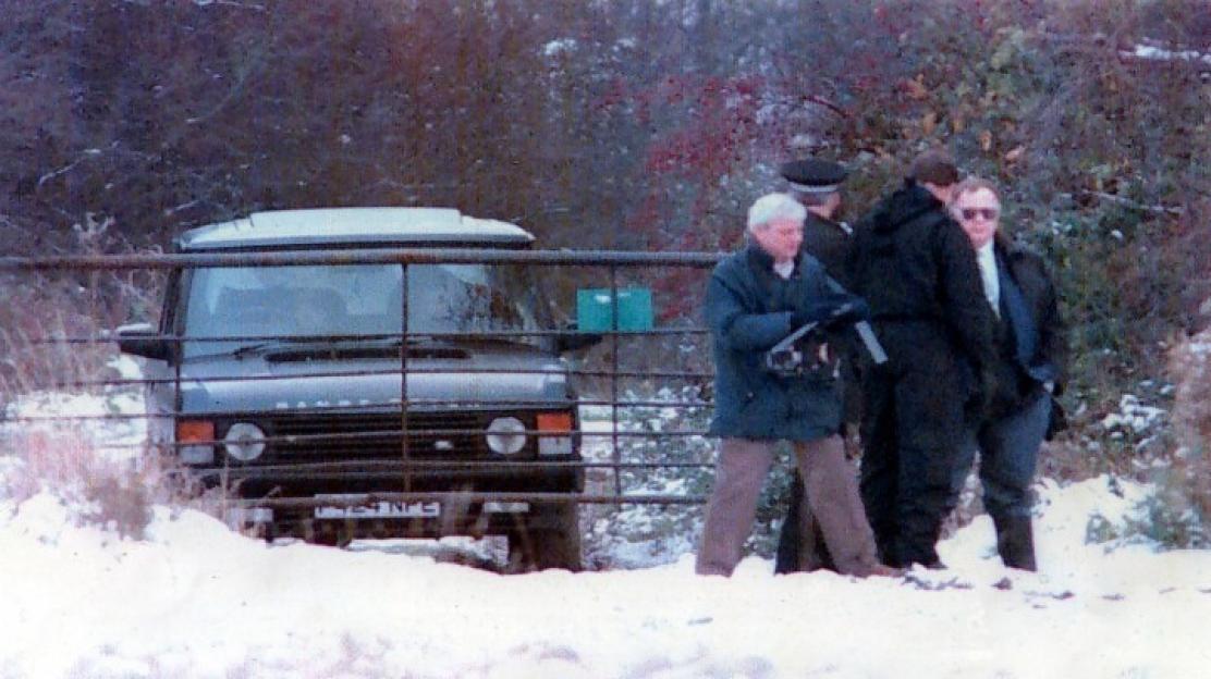 Police at the crime scene of a murder in Essex. Three men were found executed in a Range Rover. The murder is thought to be drug related. The victims are Patrick Tate, Craig Rolfe and Tony Tucker.