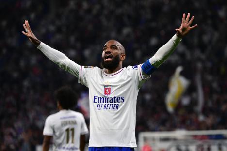 Alexandre Lacazette celebrates scoring a goal.