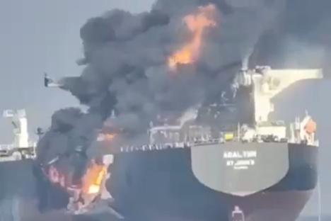 Moment huge flames leap from cargo ship as ‘dark fleet’ tanker burns at sea after being ‘hit by another boat’