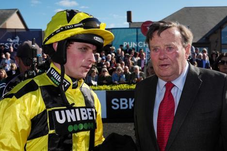 Jockey James Bowen and trainer Nicky Henderson at Punchestown Racecourse.