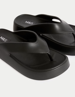 Pair of black platform flip-flops.