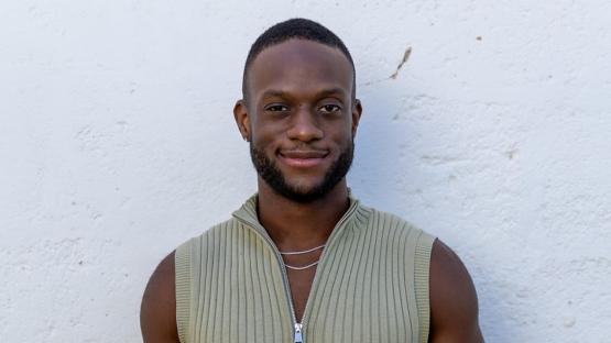 Portrait of Aron, a 27-year-old civil servant and cheerleading coach from Croydon.