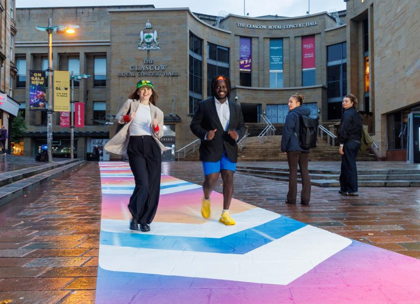 Members of the public speed walking on the new Sky Fast Lane next to Glasgow’s Buchanan Galleries.