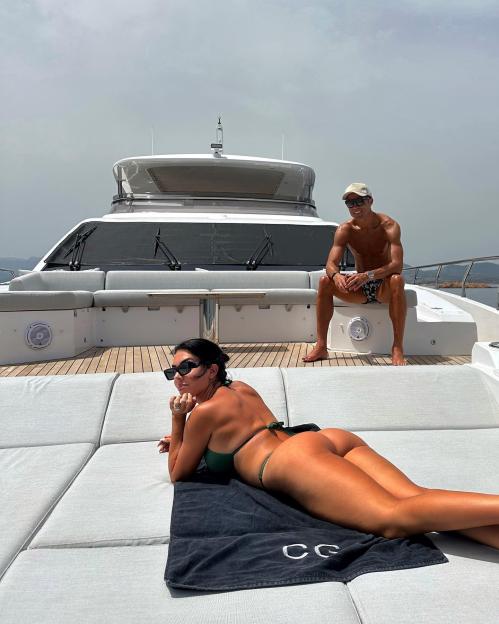Georgina Rodriguez and Cristiano Ronaldo on a yacht.