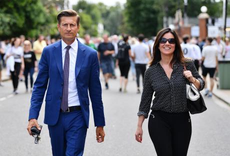 Steve Parish, Crystal Palace chairman, walking with a woman.