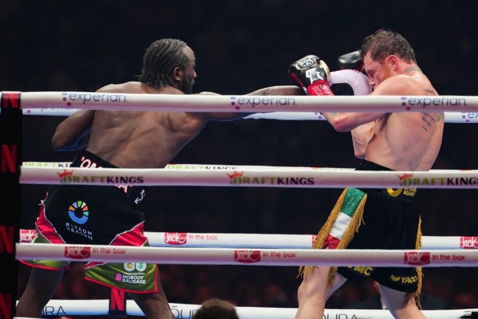 Terence Crawford in amazing show of respect by handing BACK world titles to Canelo Alvarez and high-fiving his daughter