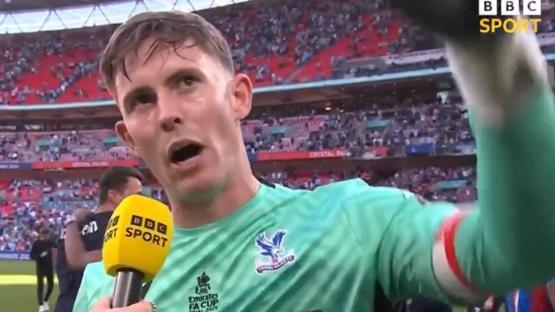 Soccer player being interviewed after a game.