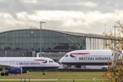 Two British Airways planes at Heathrow Airport.