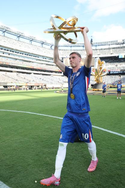 Cole Palmer of Chelsea FC lifts the FIFA Club World Cup trophy.