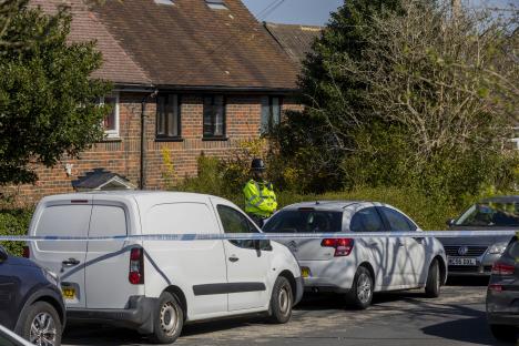 Police officer at a murder scene in Brighton.