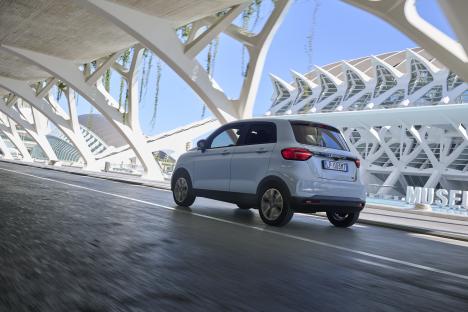 A light gray LeapMotor driving on a road.