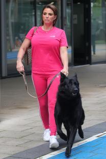 Katie Price walking her dog.