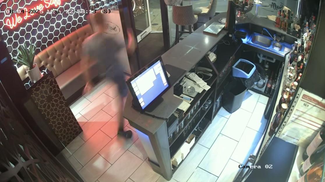 Security camera footage of a dine and dash incident.