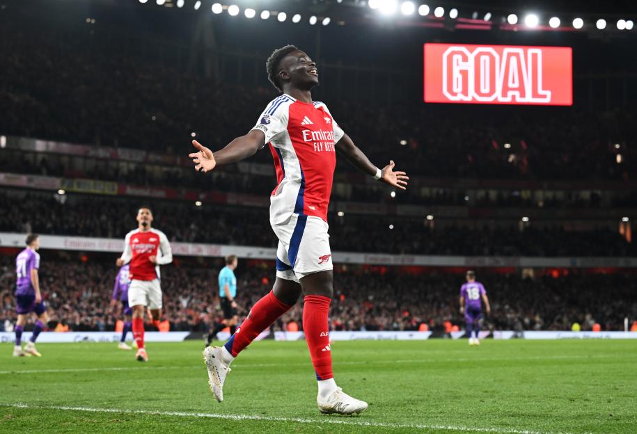 Bukayo Saka of Arsenal celebrating a goal.