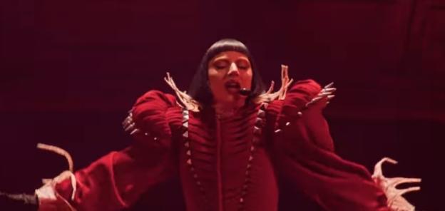 Lady Gaga performing at Coachella with a broken microphone.