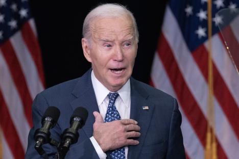 President Biden speaking at a conference.