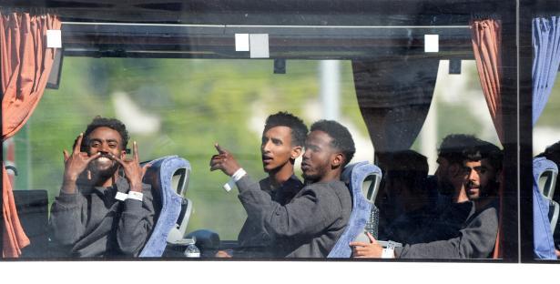 Migrants on a bus in Dover.