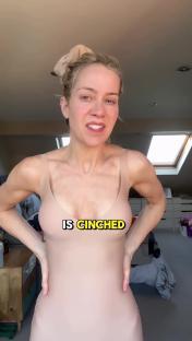 Woman in a beige body suit. Text overlay reads
