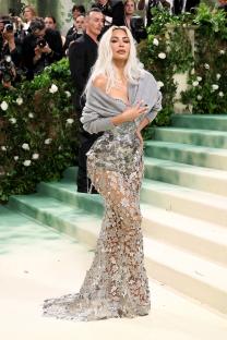 Kim Kardashian at the Met Gala in a silver dress.