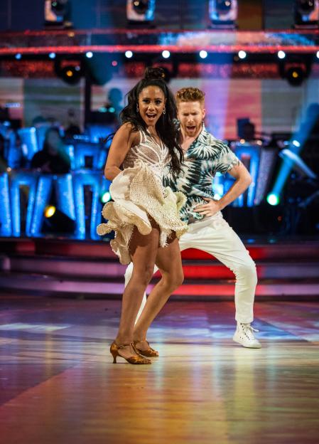 Alex Scott and Neil Jones dancing in a competition.