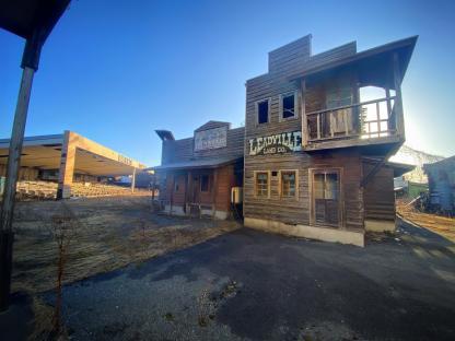 Derelict buildings of an abandoned Western-themed Japanese amusement park.