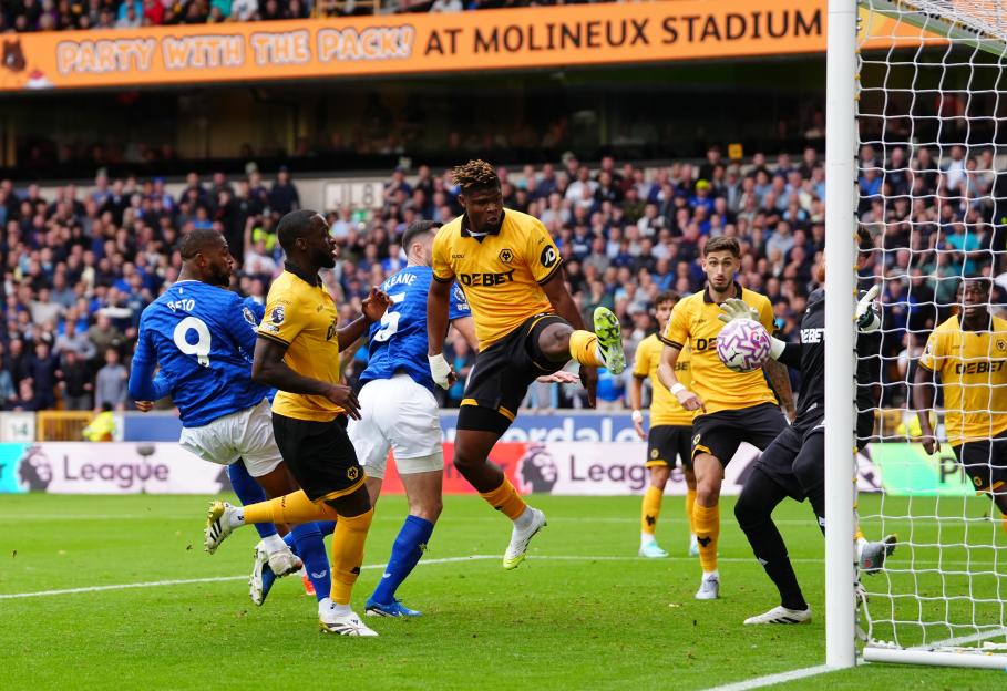 Everton's Beto scores a goal during a Premier League match.
