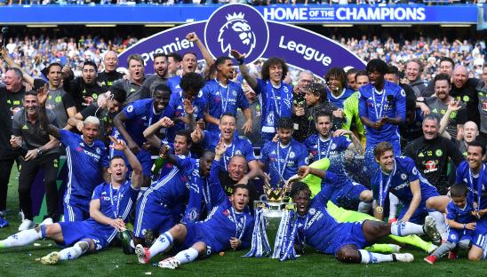 Chelsea F.C. players celebrating their Premier League title win.