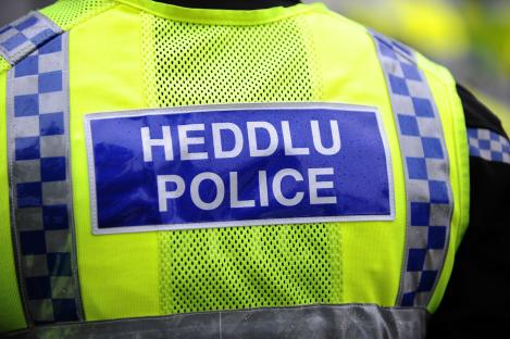 Back of a Welsh police officer's uniform.