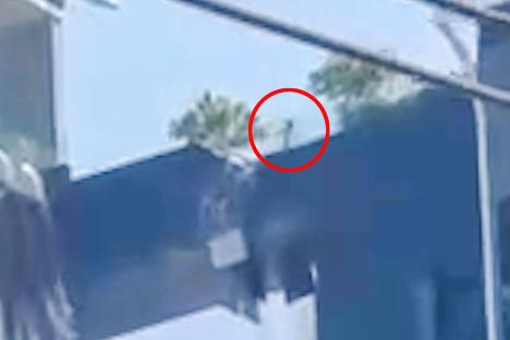 Watch hero dad leap from one crumbling skyscraper to another to save wife and daughter during horror Myanmar earthquake